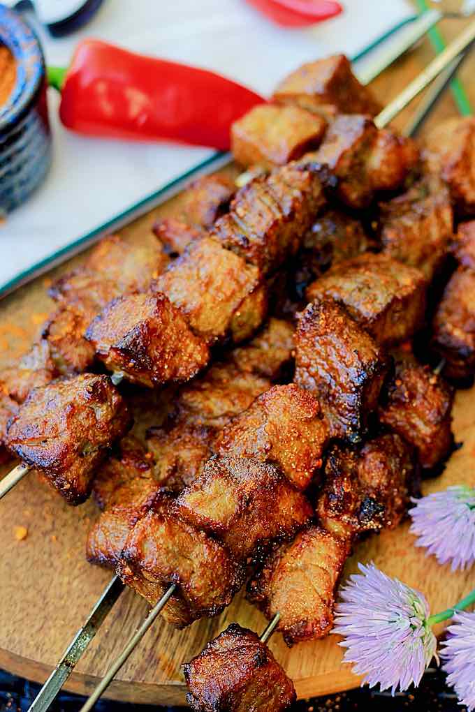 Grilled beef suya skewers coated in dry seasoning
